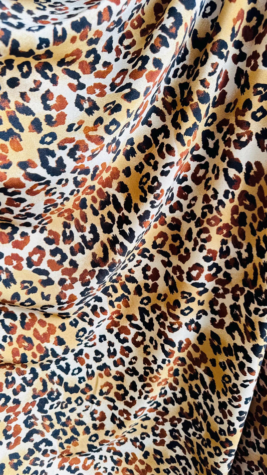 New Exotic Leopard design Gold/Brown print on best quality of nylon spandex 4-way 58/60" Sold by the YD. Ships worldwide from Los Angeles CA