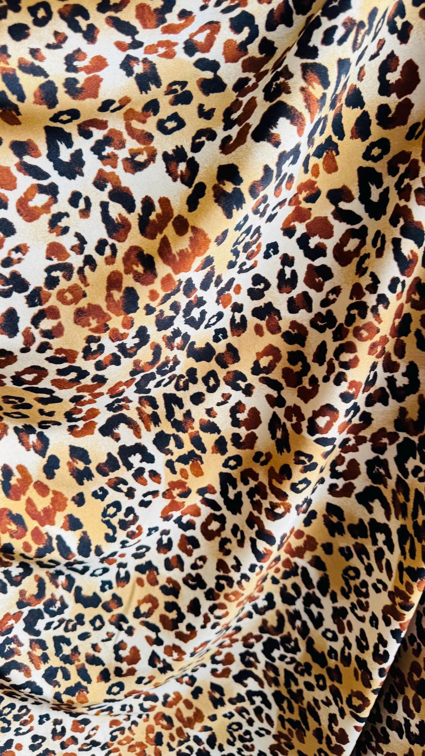 New Exotic Leopard design Gold/Brown print on best quality of nylon spandex 4-way 58/60" Sold by the YD. Ships worldwide from Los Angeles CA