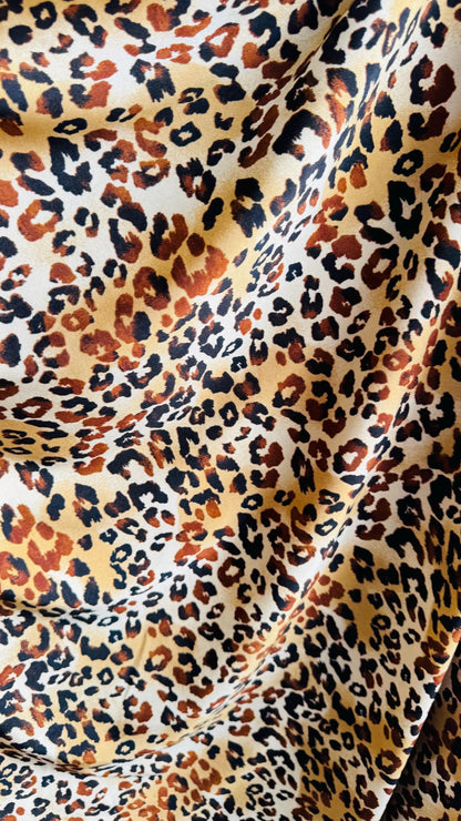 New Exotic Leopard design Gold/Brown print on best quality of nylon spandex 4-way 58/60" Sold by the YD. Ships worldwide from Los Angeles CA