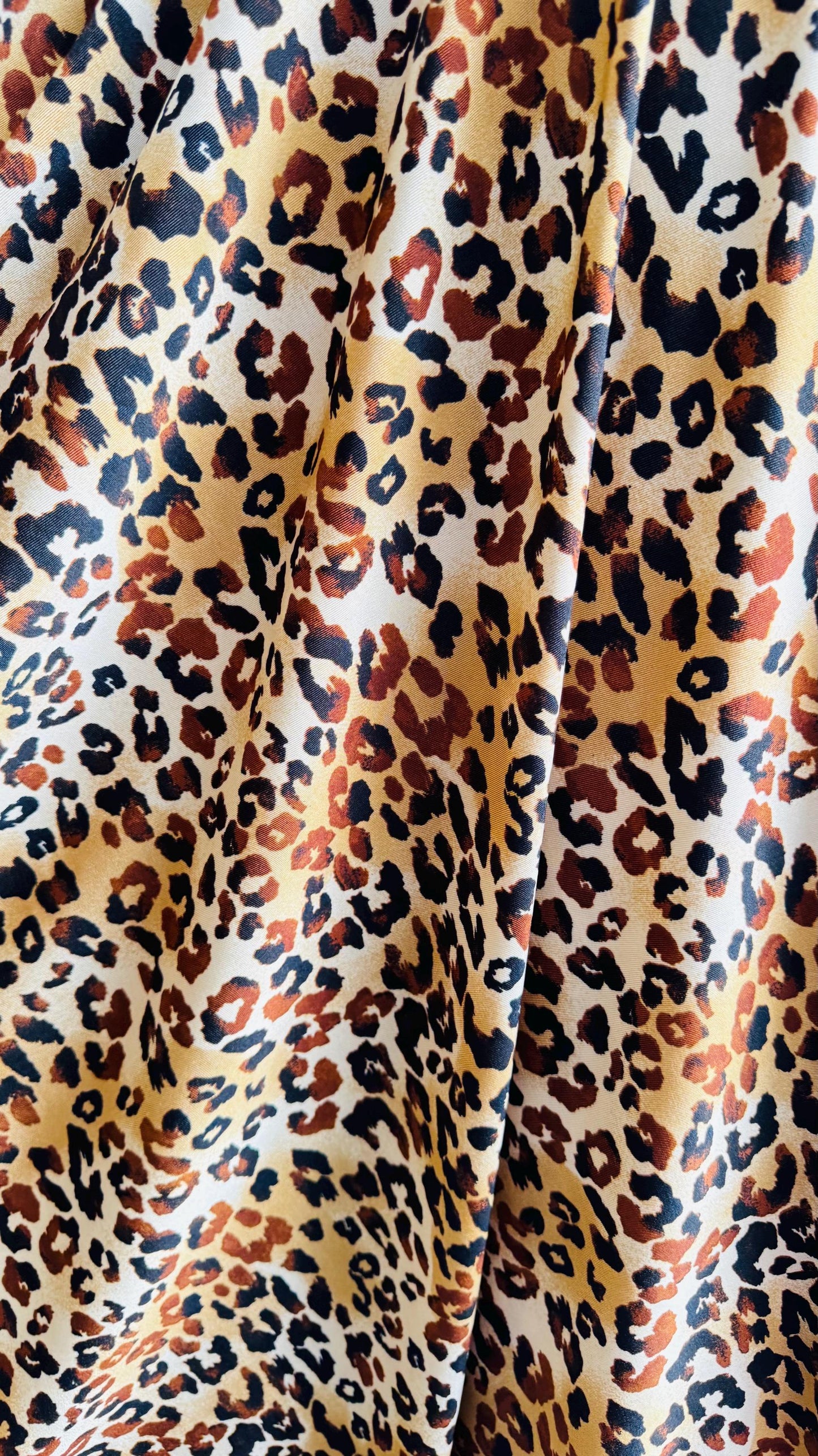 New Exotic Leopard design Gold/Brown print on best quality of nylon spandex 4-way 58/60" Sold by the YD. Ships worldwide from Los Angeles CA