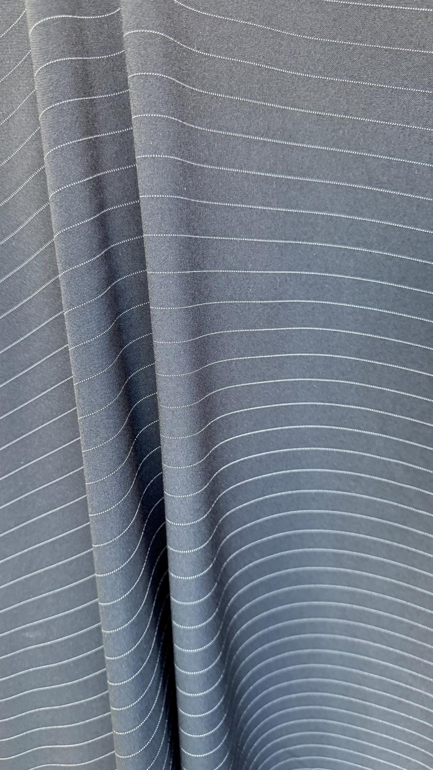 Pin stripes on poly spandex 2-way stretch 58/60” Sold by the YD. Ships worldwide from Los Angeles California USA. High quality fabrics