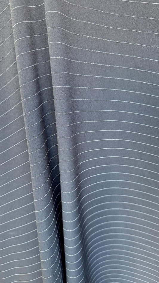 Pin stripes on poly spandex 2-way stretch 58/60” Sold by the YD. Ships worldwide from Los Angeles California USA. High quality fabrics