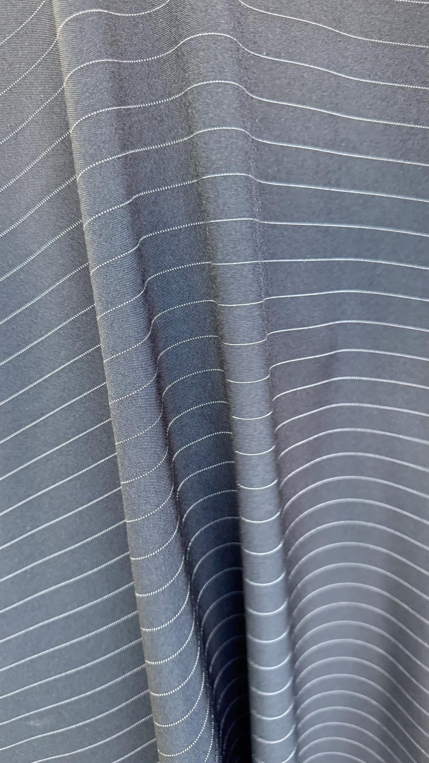 Pin stripes on poly spandex 2-way stretch 58/60” Sold by the YD. Ships worldwide from Los Angeles California USA. High quality fabrics