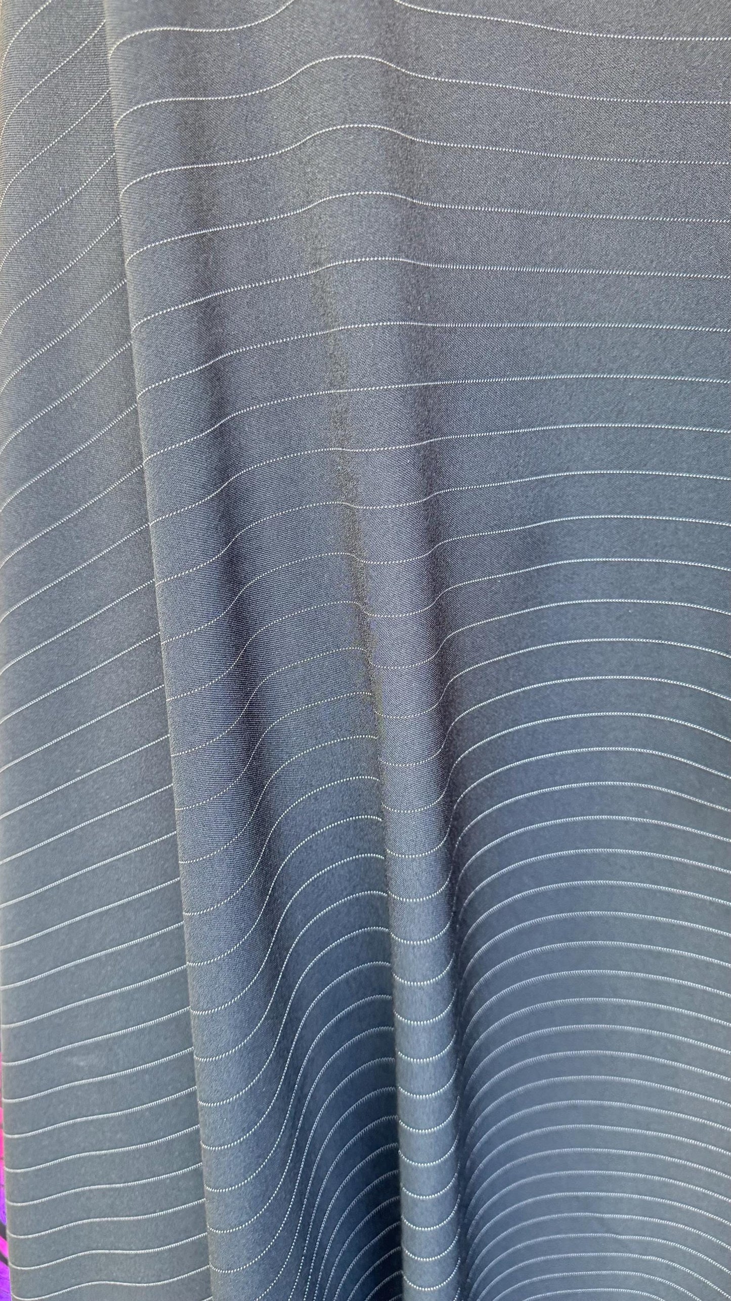 Pin stripes on poly spandex 2-way stretch 58/60” Sold by the YD. Ships worldwide from Los Angeles California USA. High quality fabrics