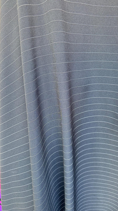 Pin stripes on poly spandex 2-way stretch 58/60” Sold by the YD. Ships worldwide from Los Angeles California USA. High quality fabrics