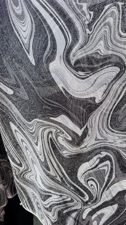 New Lava abstract design print on power mesh 4-way stretch see though fabric 58/60” Sold by the YD. Ships Worldwide from Los Ángeles CA.