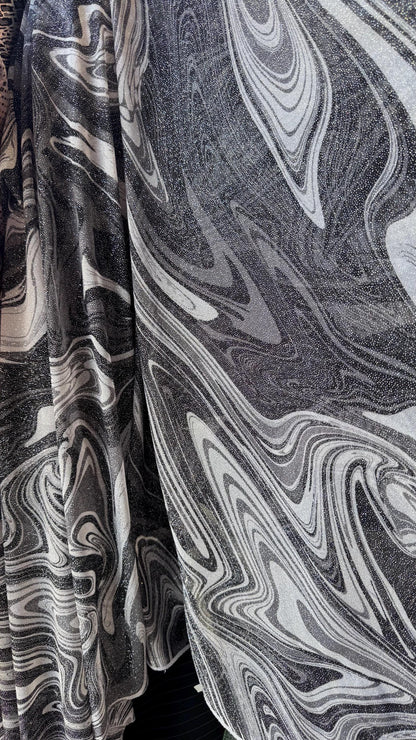 New Lava abstract design print on power mesh 4-way stretch see though fabric 58/60” Sold by the YD. Ships Worldwide from Los Ángeles CA.