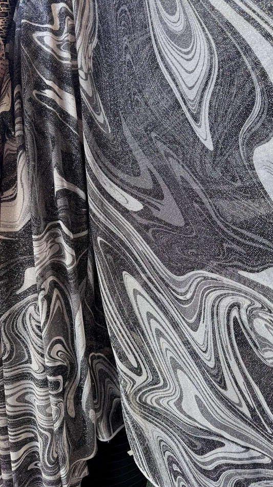 New Lava abstract design print on power mesh 4-way stretch see though fabric 58/60” Sold by the YD. Ships Worldwide from Los Ángeles CA.
