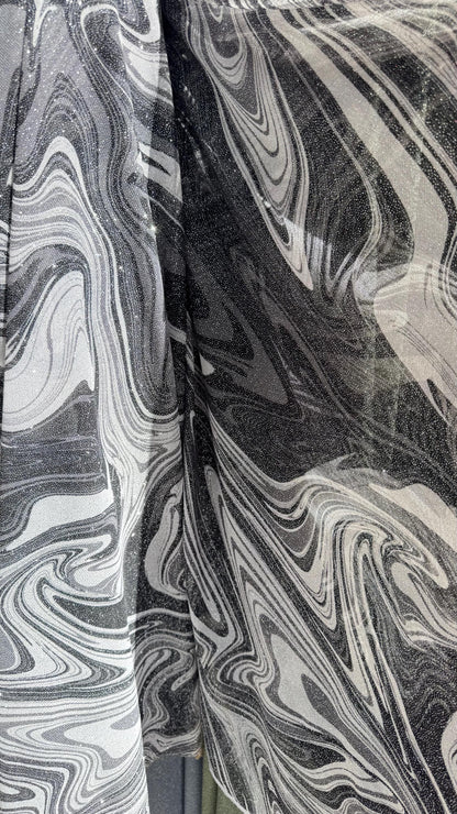 New Lava abstract design print on power mesh 4-way stretch see though fabric 58/60” Sold by the YD. Ships Worldwide from Los Ángeles CA.
