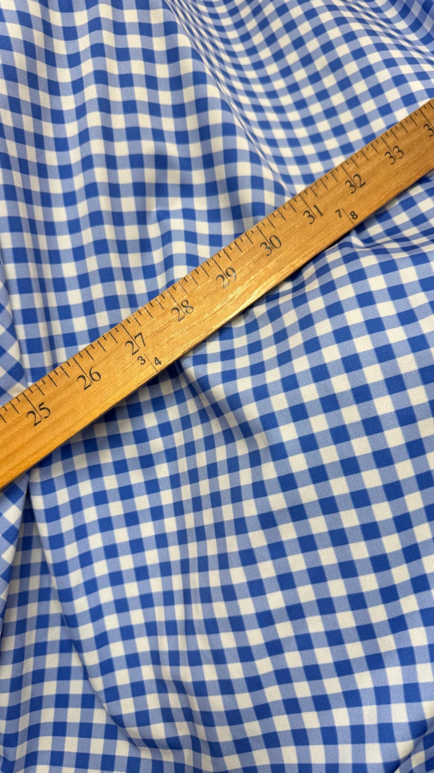 Gingham design Blue/White Nylon spandex 4-way stretch 58/60”Sold by the YD. Ships Worldwide from Los Angeles California USA. High quality