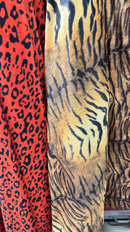 NEW Exotic Animal designs print on great quality of stretch velvet 4-way stretch 58/60” Sold by the YD. Ships Worldwide from Los Angeles CA