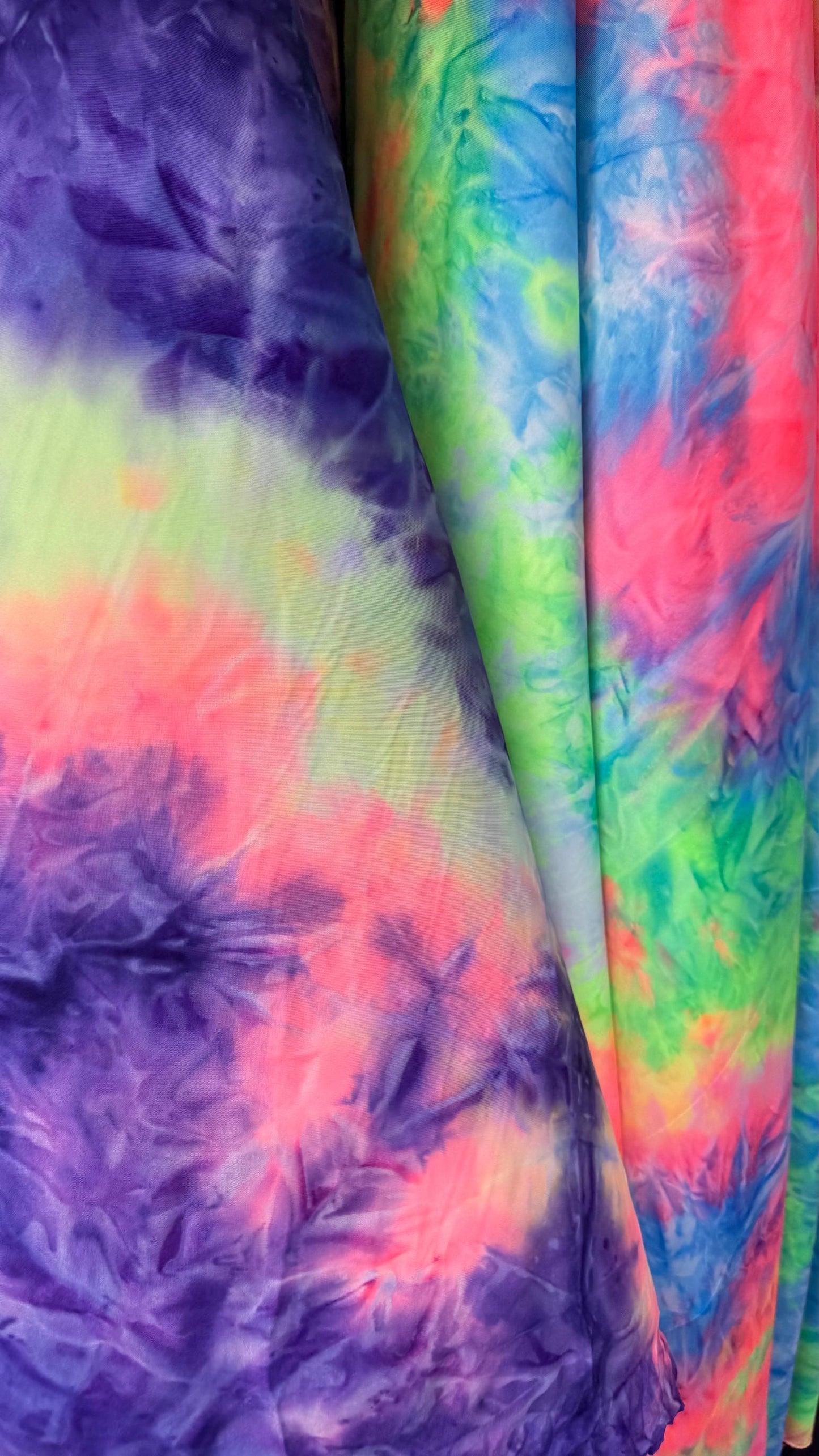 New Tie Dye Print on poly  spandex 4way Stretch 58/60" Sold by the YD. Ships worldwide from Los Angeles California USA. High quality fabrics