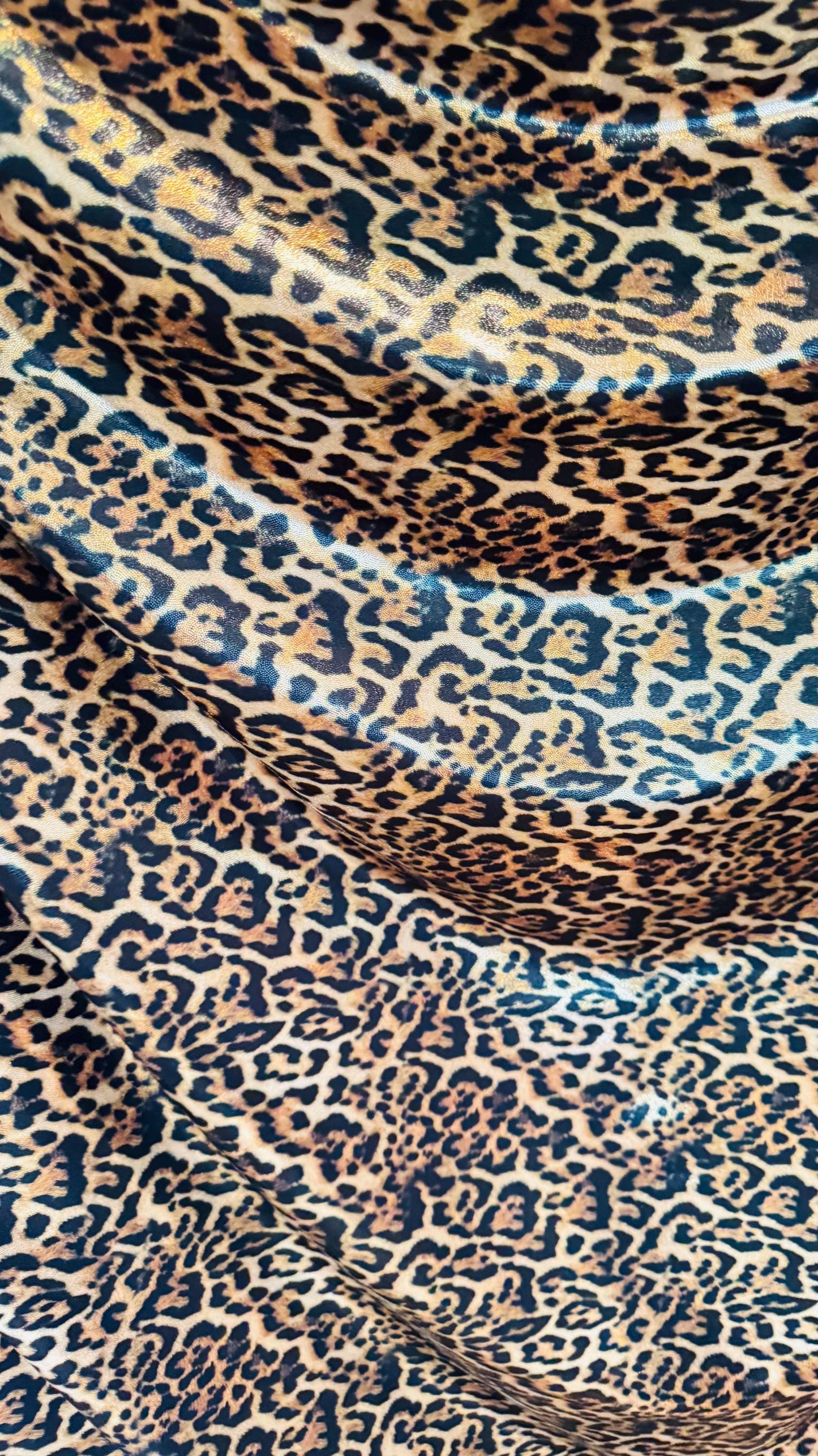New Jaguar design metallic nylon spandex with foggy foil 4-way stretch i 58/60” Sold by the YD. Ships worldwide from Los Angeles California