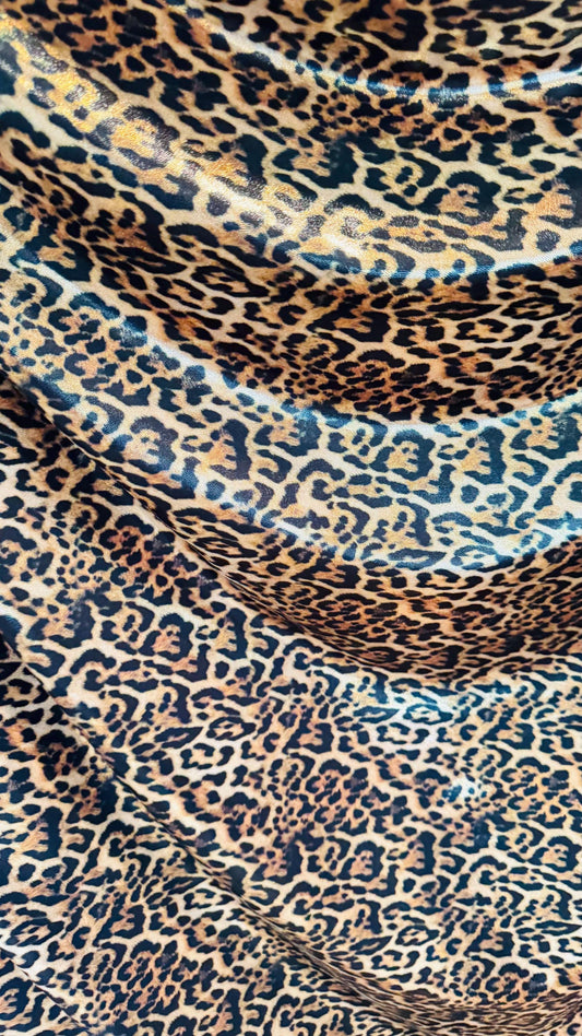 New Jaguar design metallic nylon spandex with foggy foil 4-way stretch i 58/60” Sold by the YD. Ships worldwide from Los Angeles California