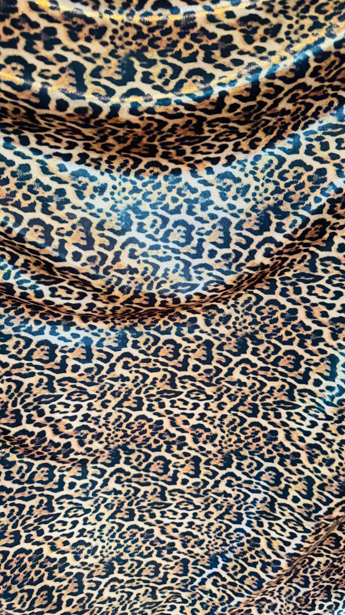 New Jaguar design metallic nylon spandex with foggy foil 4-way stretch i 58/60” Sold by the YD. Ships worldwide from Los Angeles California