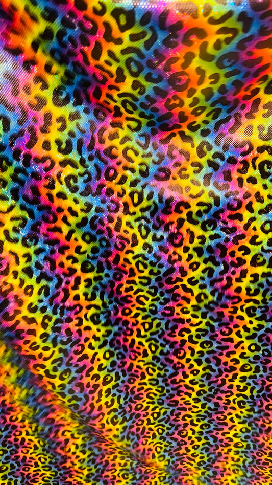 NEW Metallic Leopard rainbow design on shattered glass Hologram spandex 4way stretch 58/60” Sold by the YD. Ships Worldwide from Los Angeles