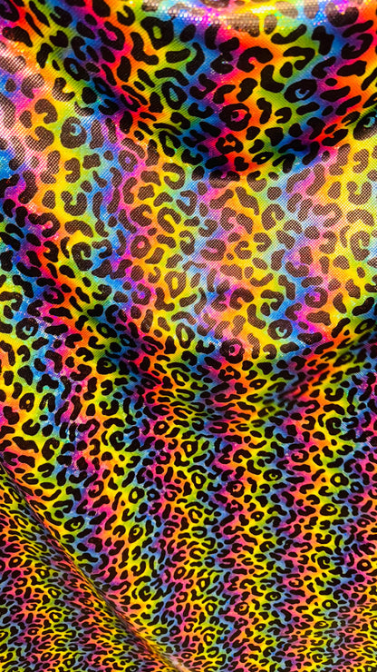 NEW Metallic Leopard rainbow design on shattered glass Hologram spandex 4way stretch 58/60” Sold by the YD. Ships Worldwide from Los Angeles