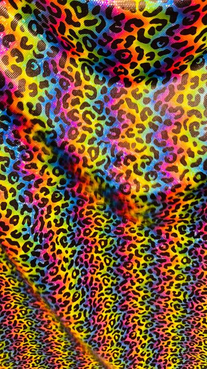 NEW Metallic Leopard rainbow design on shattered glass Hologram spandex 4way stretch 58/60” Sold by the YD. Ships Worldwide from Los Angeles