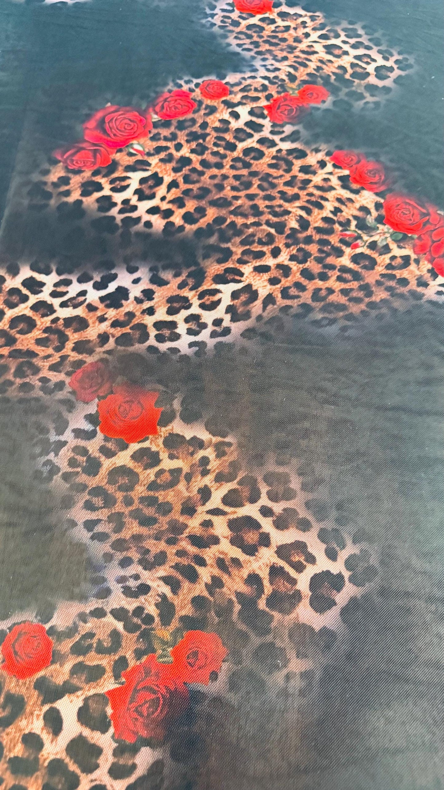 New Exotic Hiding leopard design print on power mesh 4-way stretch 58/60” Sold by the YD. Ships worldwide from Los Angeles California USA.