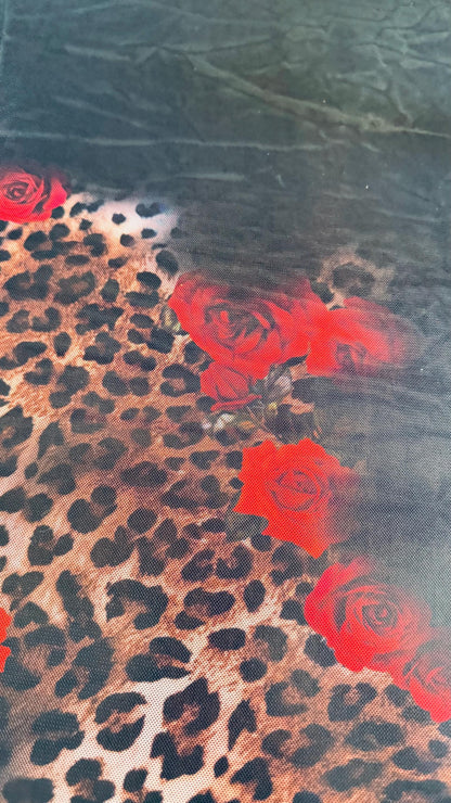 New Exotic Hiding leopard design print on power mesh 4-way stretch 58/60” Sold by the YD. Ships worldwide from Los Angeles California USA.