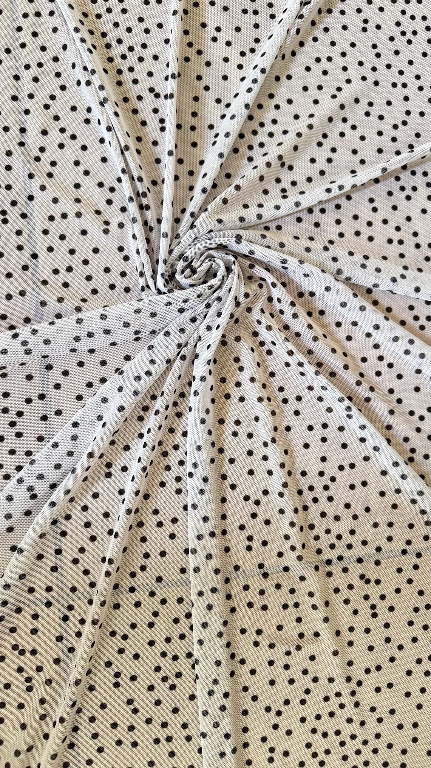 Polka dots design on power mesh nylon spandex  4-way stretch 58/60” Sold by the YD. Ships Worldwide from Los Angeles California USA