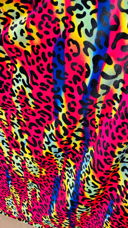 New Leopard design with vivid rainbow colors  on heavy stretch velvet 4way stretch 58/60" Sold by the YD. Ships worldwide from Los Ángeles