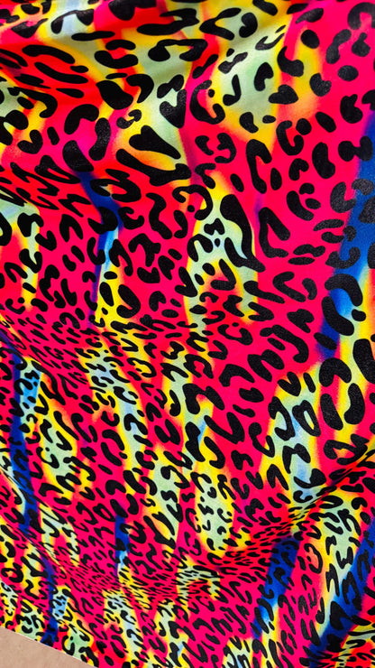 New Leopard design with vivid rainbow colors  on heavy stretch velvet 4way stretch 58/60" Sold by the YD. Ships worldwide from Los Ángeles