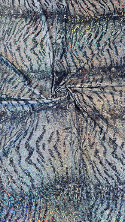Bengal White Tiger design metallic hologram nylon spandex 4way stretch 58/60" Sold by the YD. Ships worldwide from Los Angeles California
