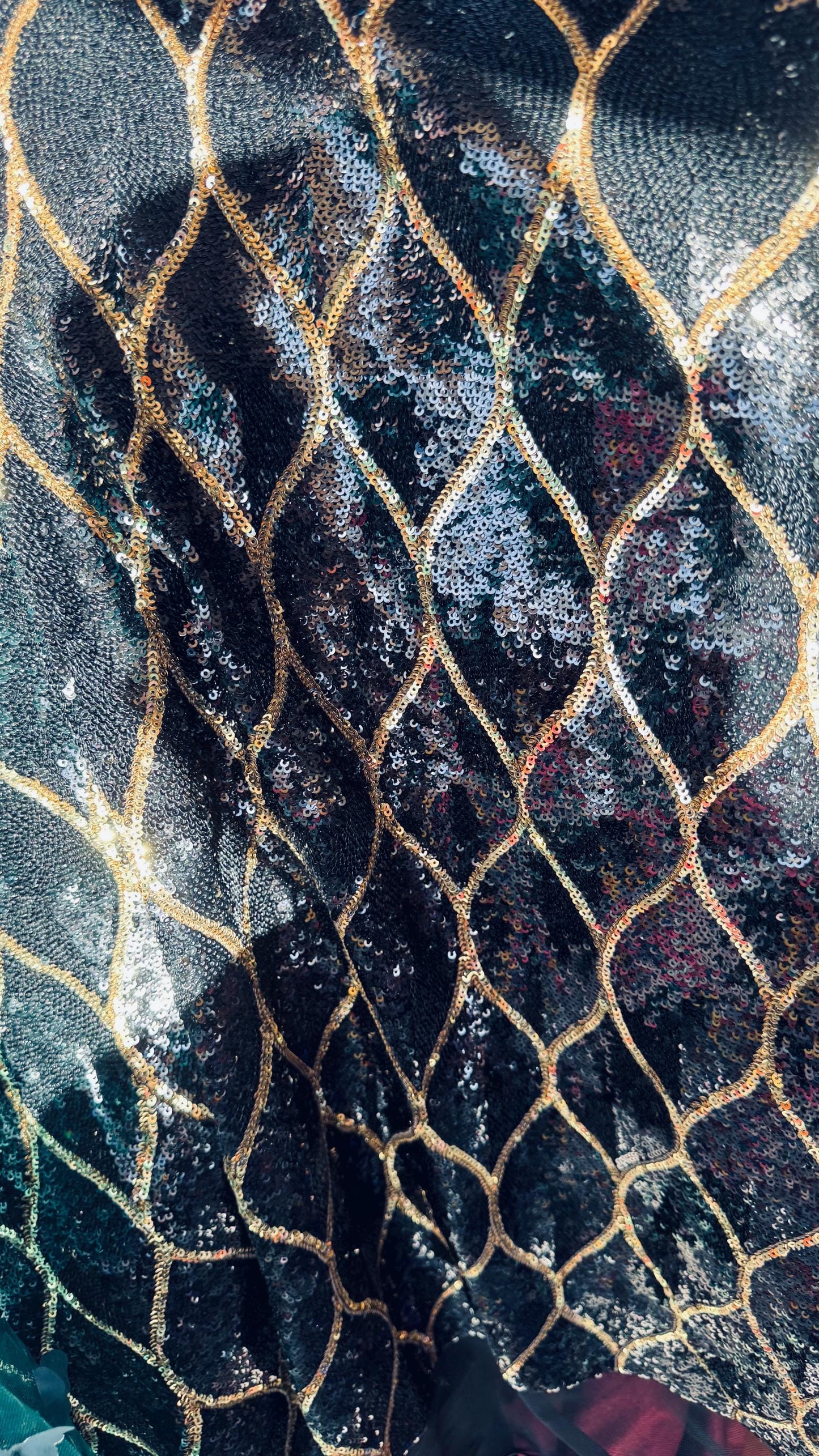 Abstract design cosmic glitz sequins Black/Gold on stretch mesh 2-way 52/54” Sold by the yd Ships worldwide from Los Angeles California USA