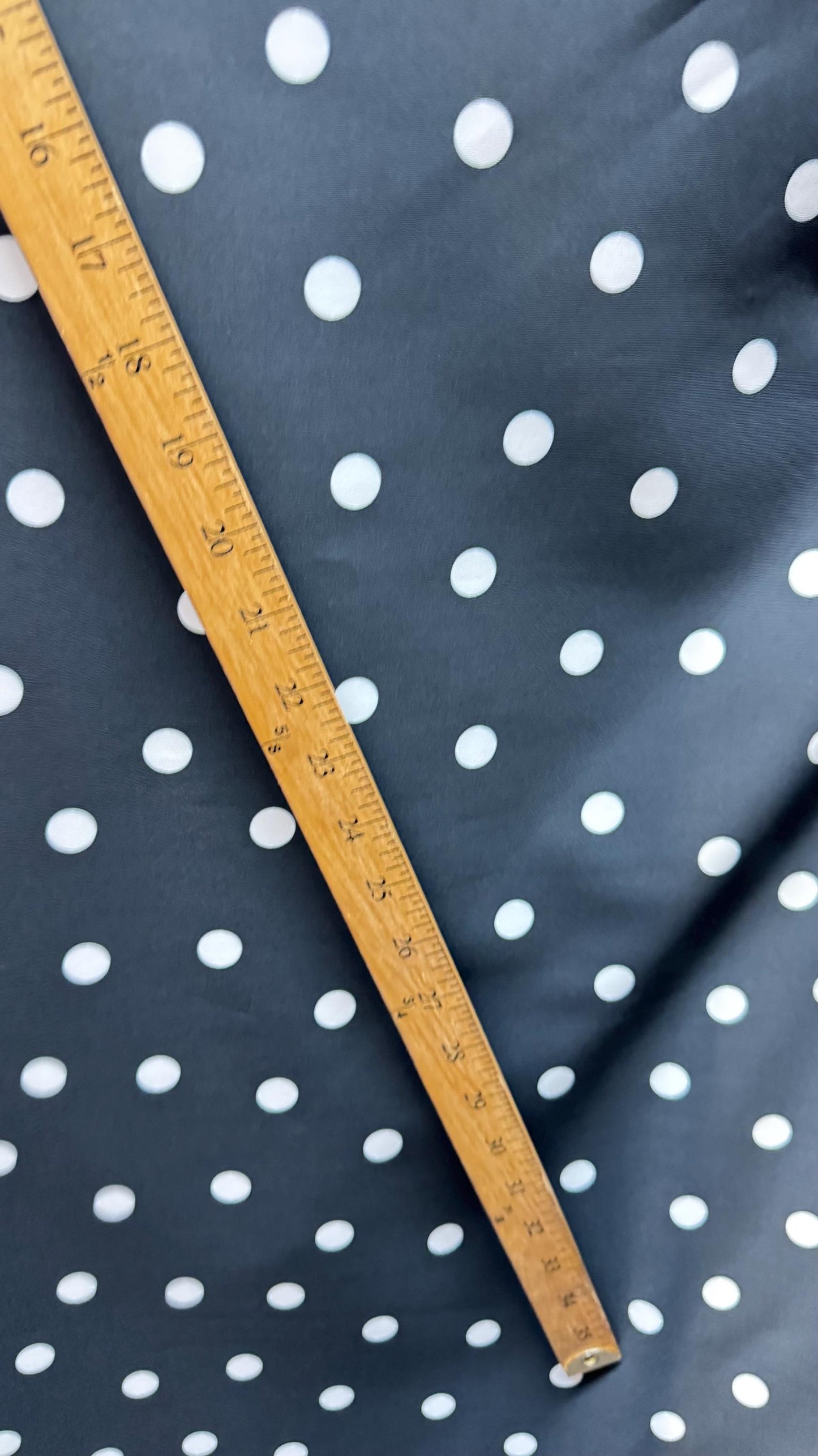 New spandex polka dots Design Black/white 4 way stretch poly spandex 58/60” Sold by the YD. Ships worldwide from Los Angeles California USA.