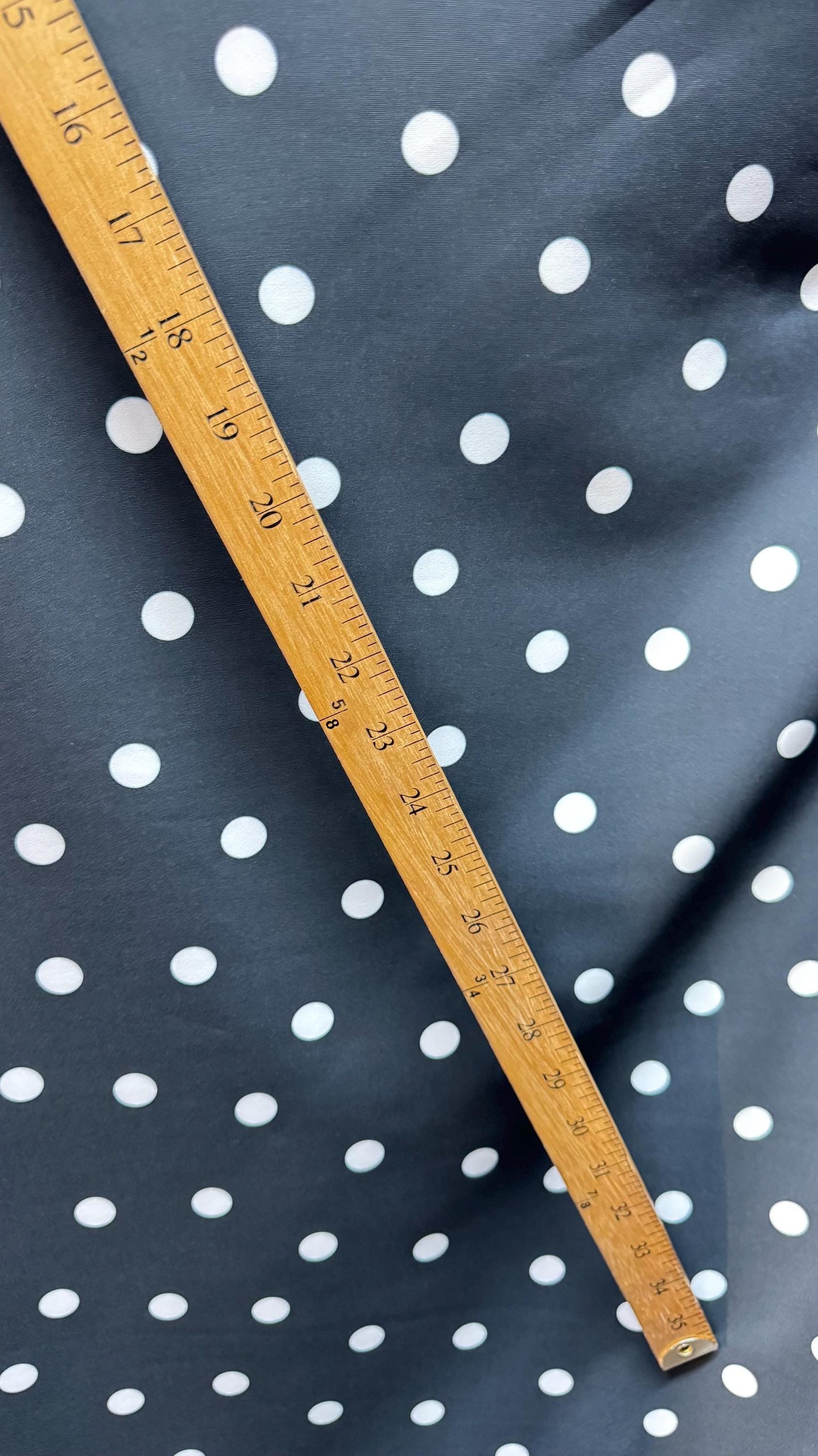 New spandex polka dots Design Black/white 4 way stretch poly spandex 58/60” Sold by the YD. Ships worldwide from Los Angeles California USA.