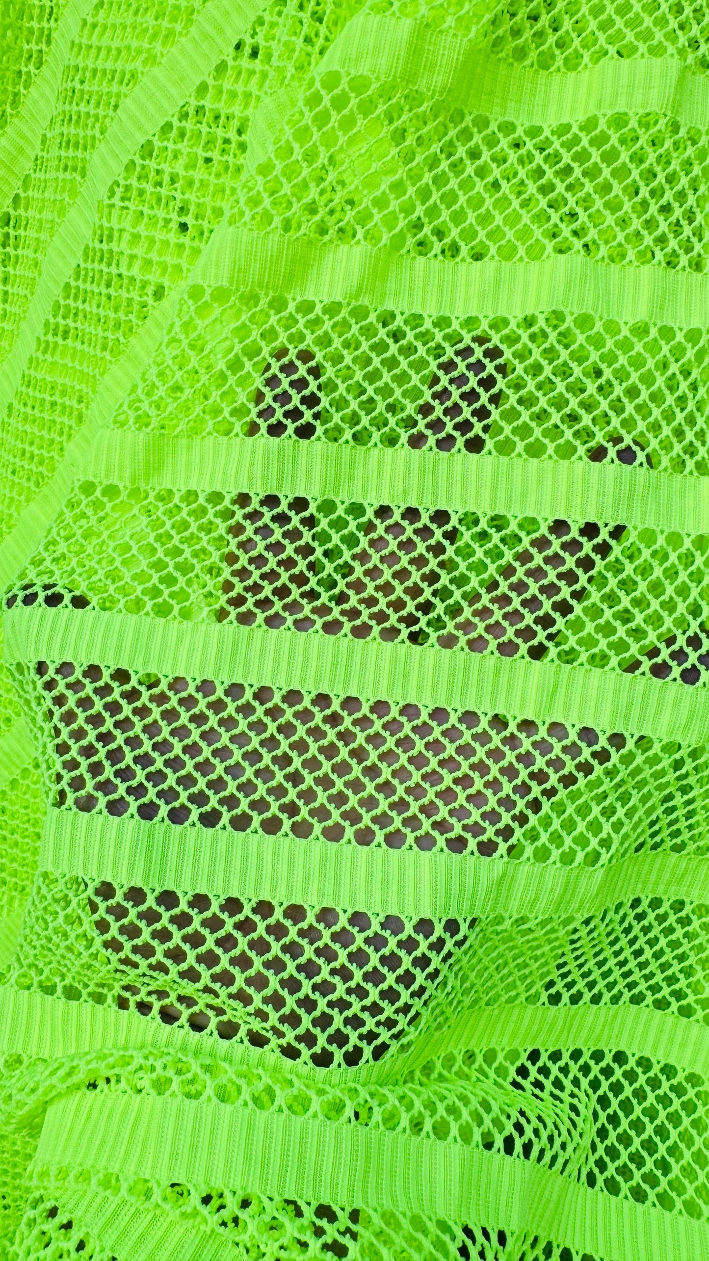 New fishnet Neon Green  with stripe design nylon spandex 2way stretch 58/60” Sold by the YD. Ships worldwide from Los Angeles California USA