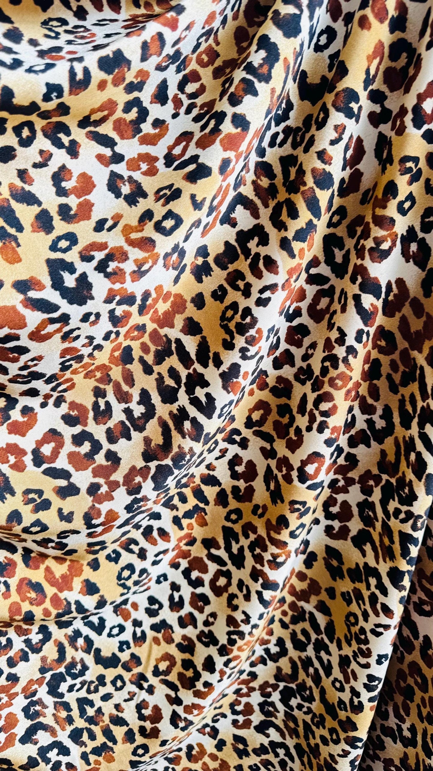 New Exotic Leopard design Gold/Brown print on best quality of nylon spandex 4-way 58/60" Sold by the YD. Ships worldwide from Los Angeles CA