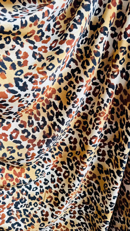New Exotic Leopard design Gold/Brown print on best quality of nylon spandex 4-way 58/60" Sold by the YD. Ships worldwide from Los Angeles CA