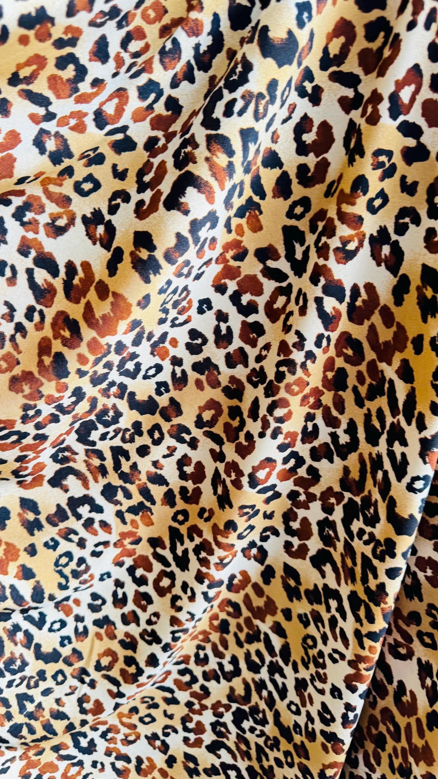 New Exotic Leopard design Gold/Brown print on best quality of nylon spandex 4-way 58/60" Sold by the YD. Ships worldwide from Los Angeles CA