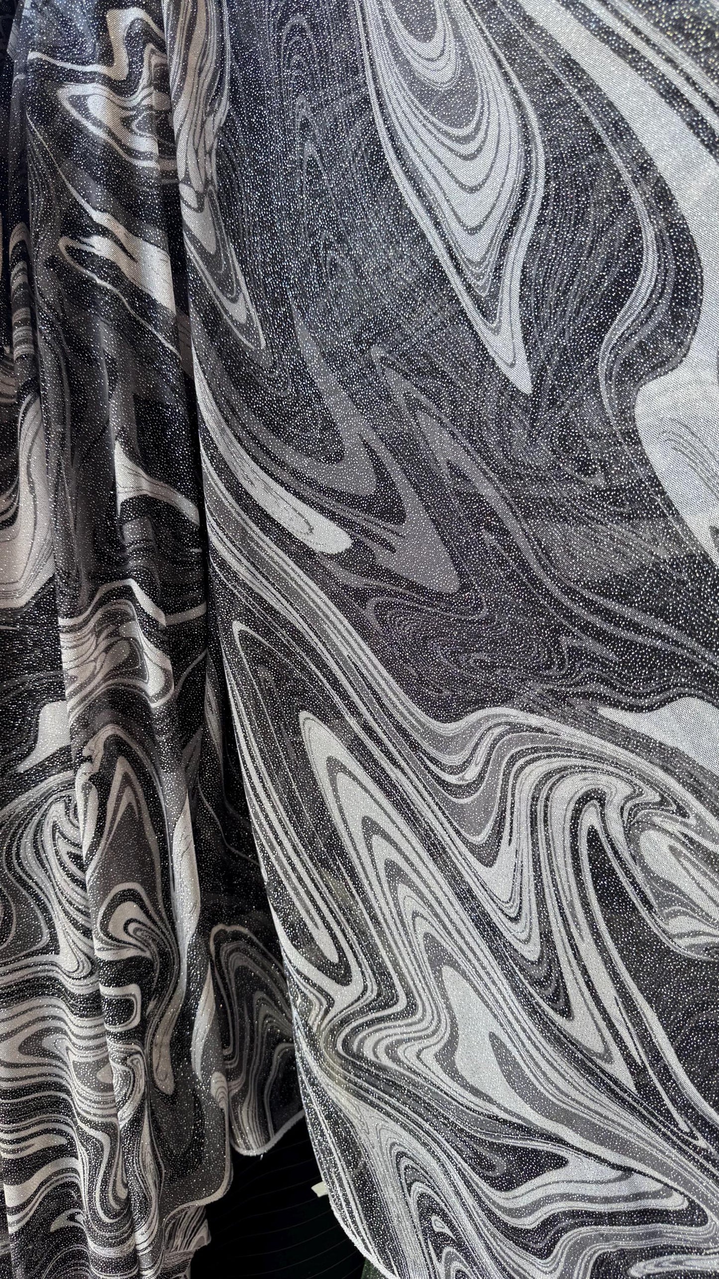 New Lava abstract design print on power mesh 4-way stretch see though fabric 58/60” Sold by the YD. Ships Worldwide from Los Ángeles CA.
