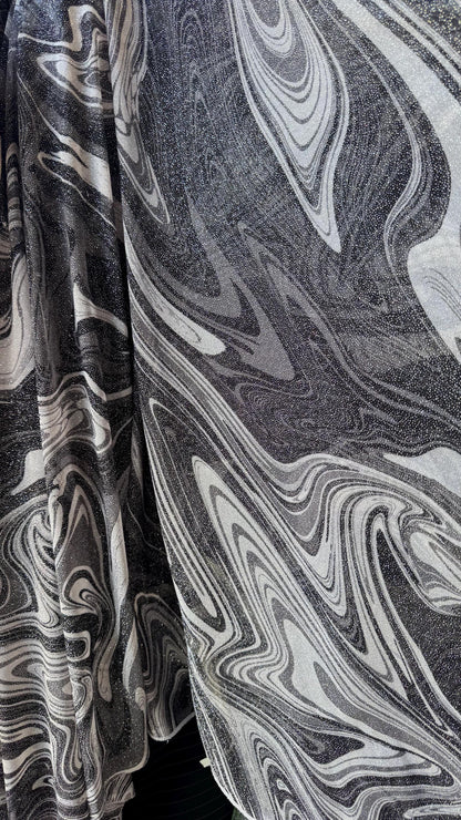 New Lava abstract design print on power mesh 4-way stretch see though fabric 58/60” Sold by the YD. Ships Worldwide from Los Ángeles CA.