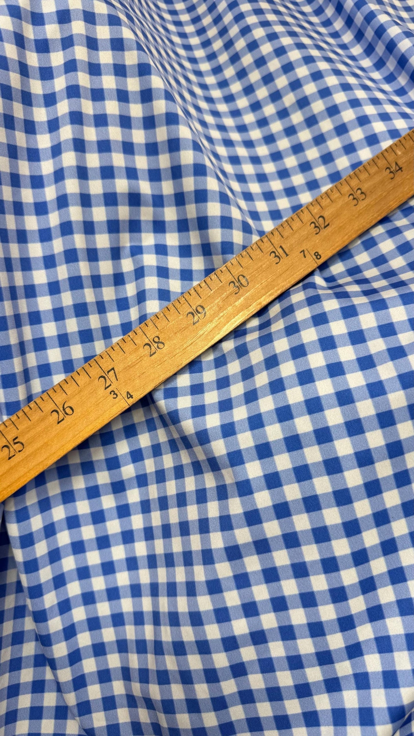 Gingham design Blue/White Nylon spandex 4-way stretch 58/60”Sold by the YD. Ships Worldwide from Los Angeles California USA. High quality