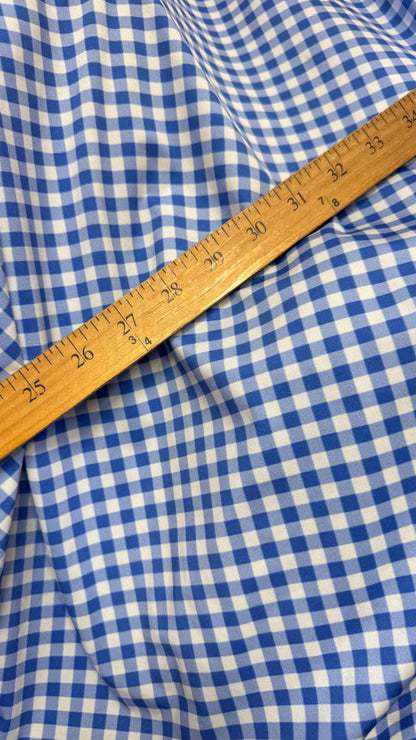 Gingham design Blue/White Nylon spandex 4-way stretch 58/60”Sold by the YD. Ships Worldwide from Los Angeles California USA. High quality