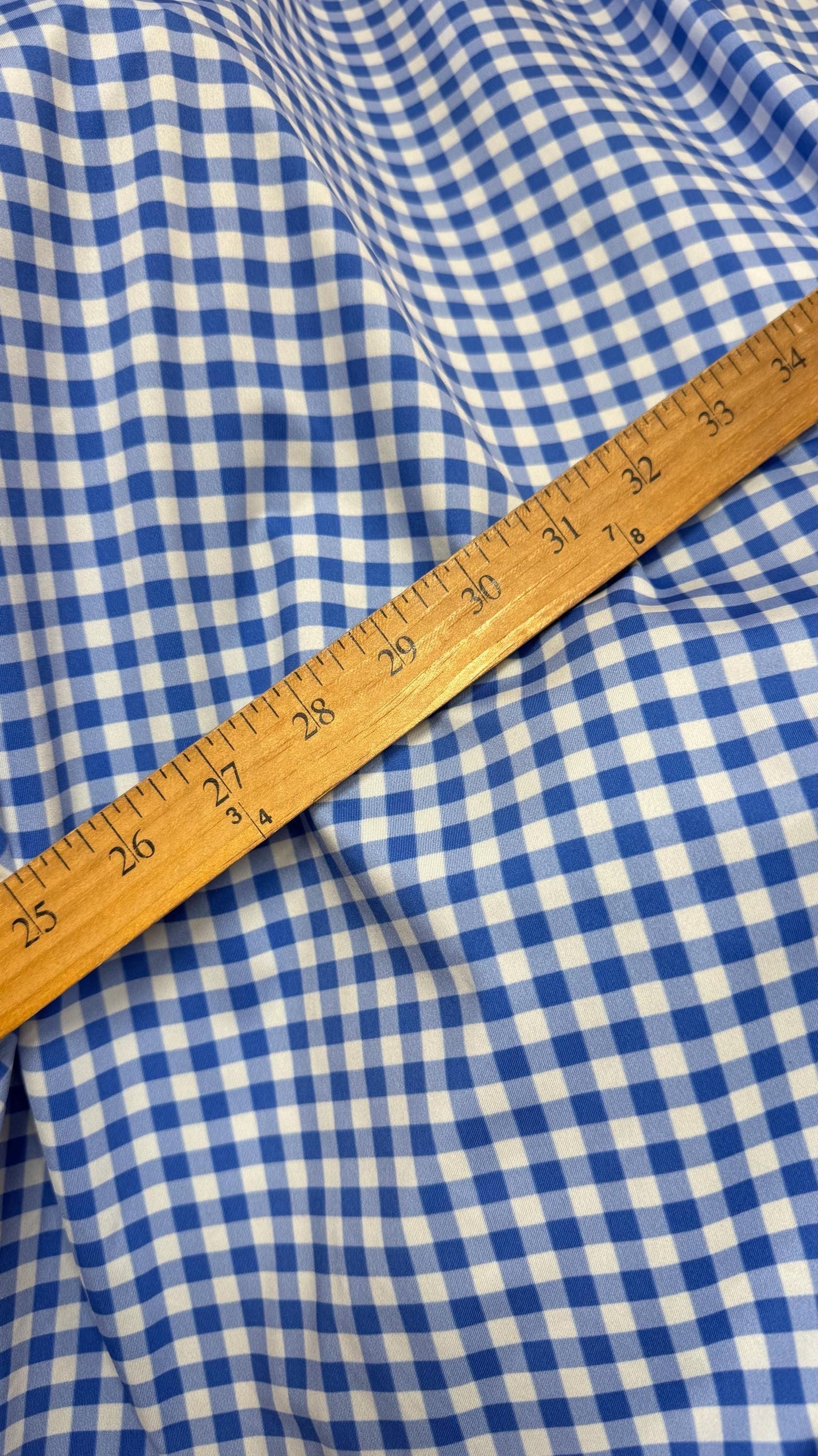 Gingham design Blue/White Nylon spandex 4-way stretch 58/60”Sold by the YD. Ships Worldwide from Los Angeles California USA. High quality