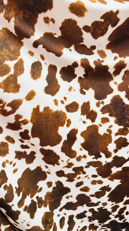 Cow Exotic design white/brown print on great quality of nylon spandex 4-way stretch 58/60” Sold by the YD. Ships Worldwide from Los Angeles