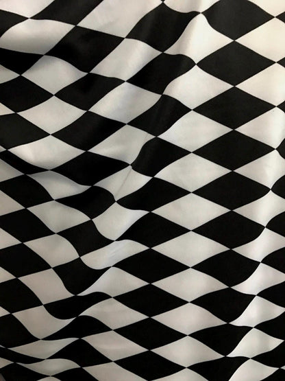 Harlequin design black/white best quality nylon spandex 4way Stretch 58/60" Sold by the YD. Ships worldwide from Los Angeles California USA