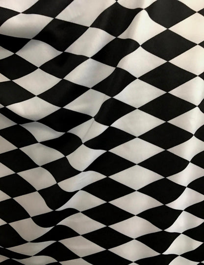 New Diamond Harlequin design black/red nylon spandex 4way stretch 58/60" Sold by the YD. Ships worldwide from Los Angeles California USA
