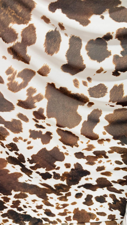 Cow design white/brown print on great quality of nylon mesh 4-way stretch 58/60” Sold by the YD. Ships Worldwide from Los Angeles California