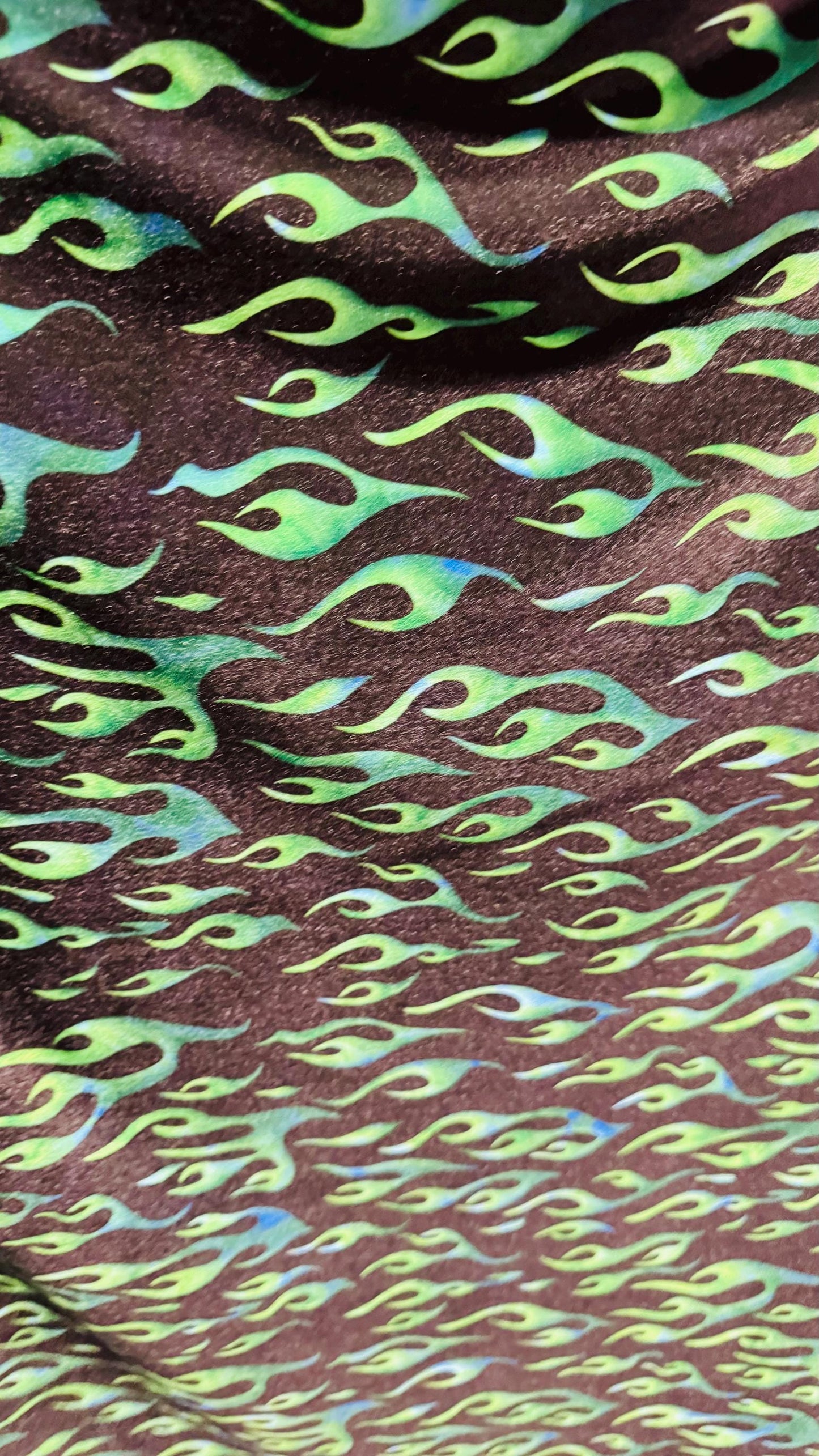 Flames design Black/Green print on best quality of stretch velvet 4-way stretch 58/60” Sold by the YD. Ships Worldwide from Los Angeles CA