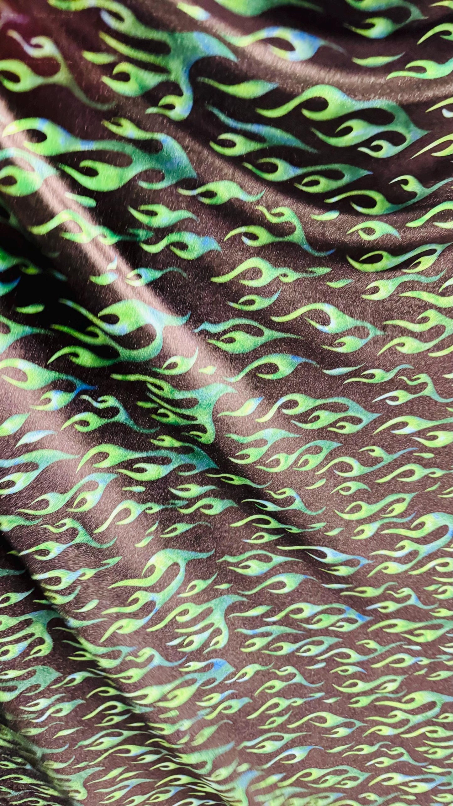 Flames design Black/Green print on best quality of stretch velvet 4-way stretch 58/60” Sold by the YD. Ships Worldwide from Los Angeles CA