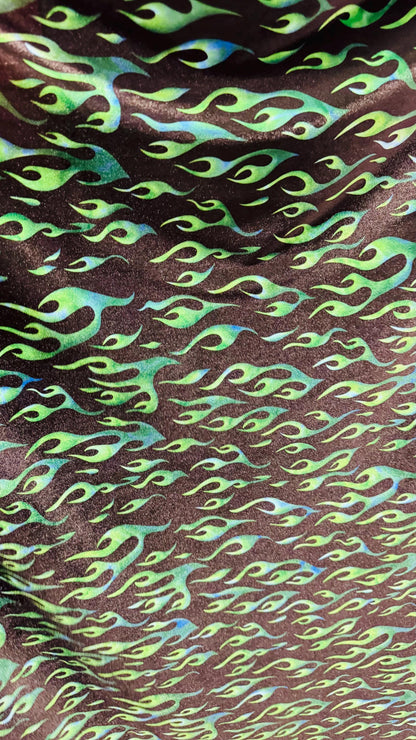 Flames design Black/Green print on best quality of stretch velvet 4-way stretch 58/60” Sold by the YD. Ships Worldwide from Los Angeles CA