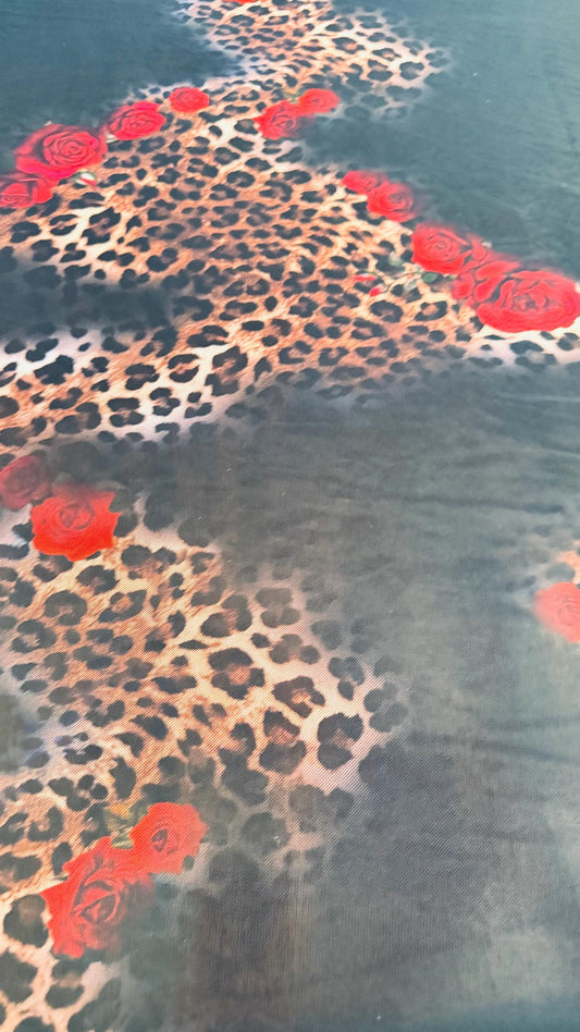 New Exotic Hiding leopard design print on power mesh 4-way stretch 58/60” Sold by the YD. Ships worldwide from Los Angeles California USA.