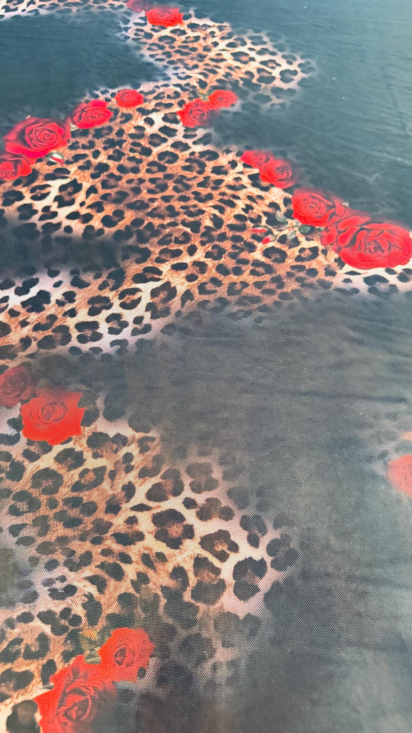 New Exotic Hiding leopard design print on power mesh 4-way stretch 58/60” Sold by the YD. Ships worldwide from Los Angeles California USA.