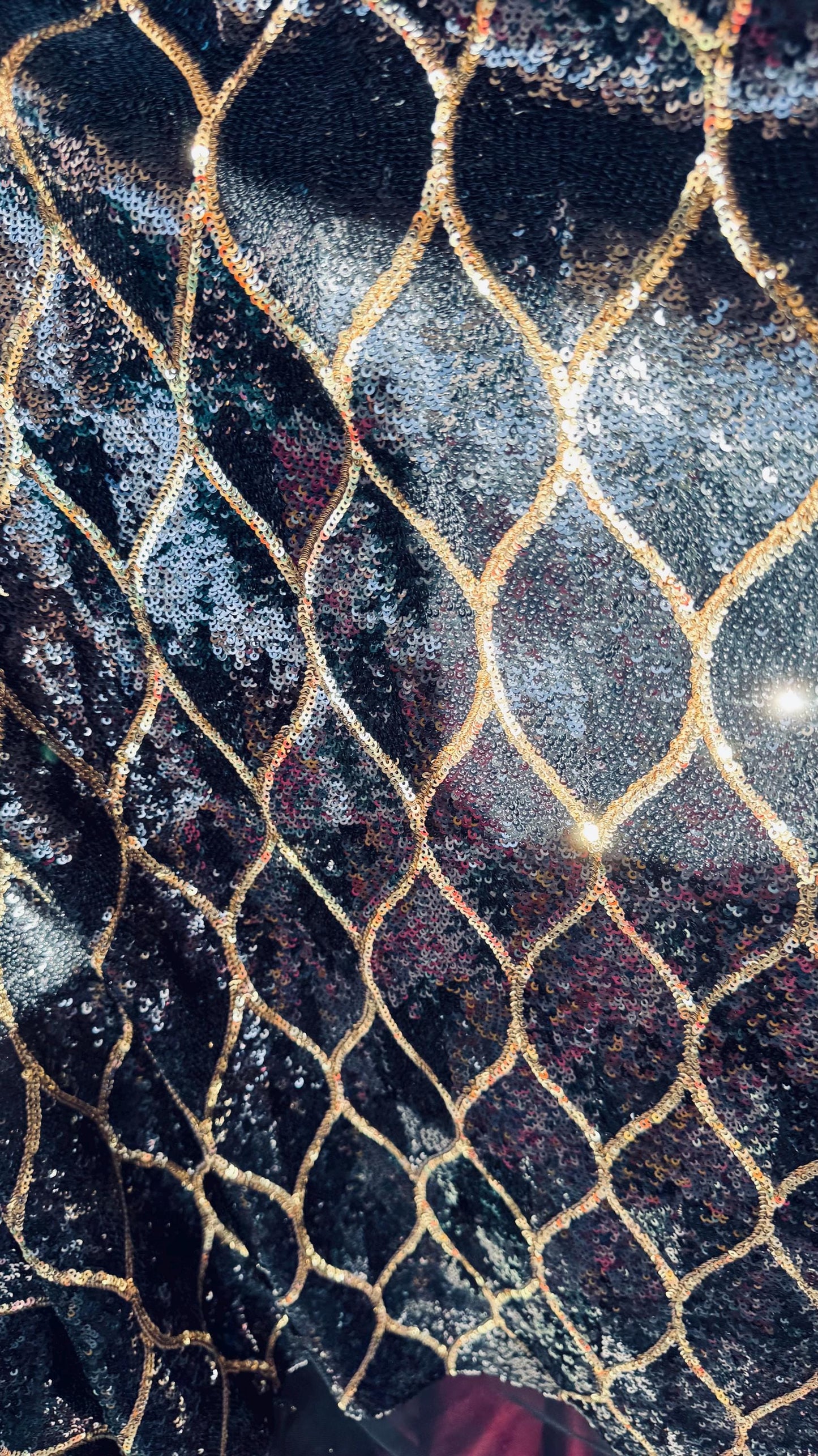 Abstract design cosmic glitz sequins Black/Gold on stretch mesh 2-way 52/54” Sold by the yd Ships worldwide from Los Angeles California USA
